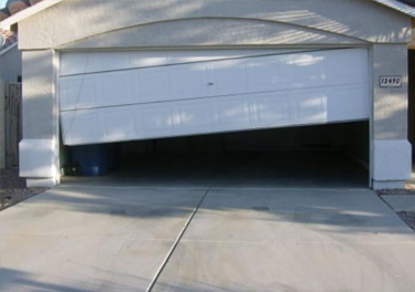 garage door off track repair in in San Marino